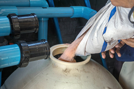 cleaning pool filter and replacing filter media