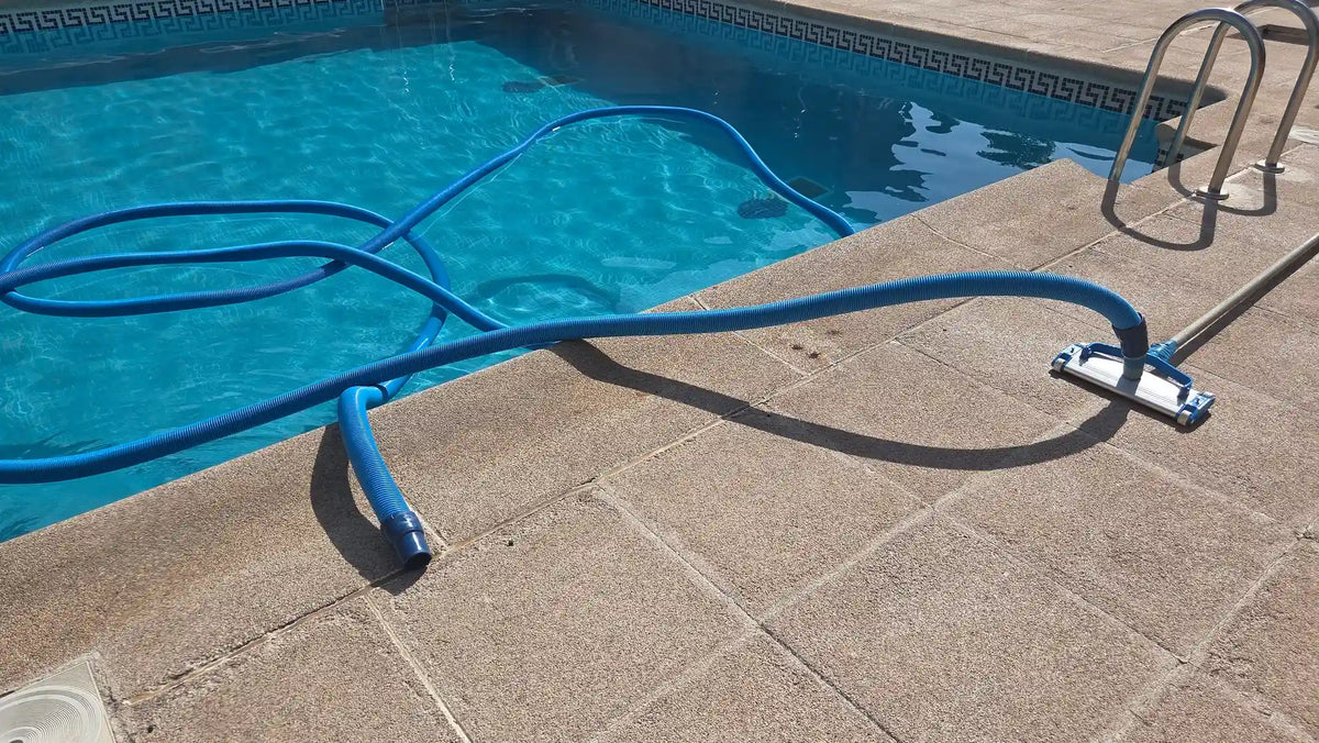 pool hose in pool