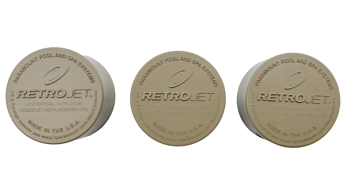 Three beige RetroJet QuickClean pool and spa nozzle replacements on white background