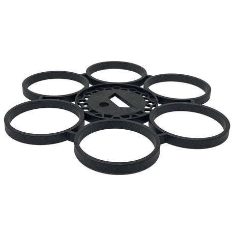 Black six-port plumbing template with circular openings and center hub