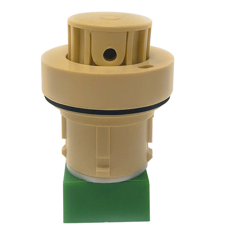 Tan low-flow pop-up head for Pentair in-floor cleaning system, shown with green base