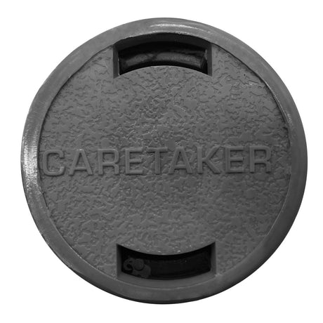 Charcoal gray Caretaker 99 bayonet in-floor cleaning head cover with textured round face