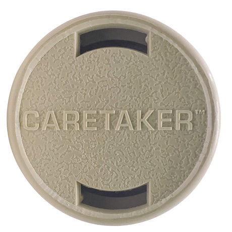 Light cream Caretaker threaded in-floor pool cleaning head with circular textured cover and black openings