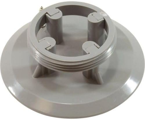 Gray floor inlet fitting cover with screws and raised center opening.