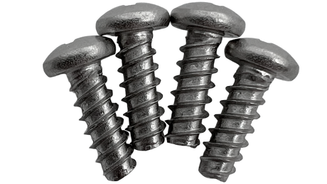 Four metal controller screws with rounded heads on a white background