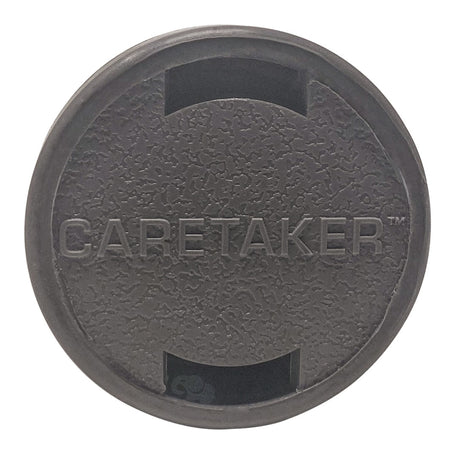 Round light gray Caretaker cleaning head with textured face and two recessed openings