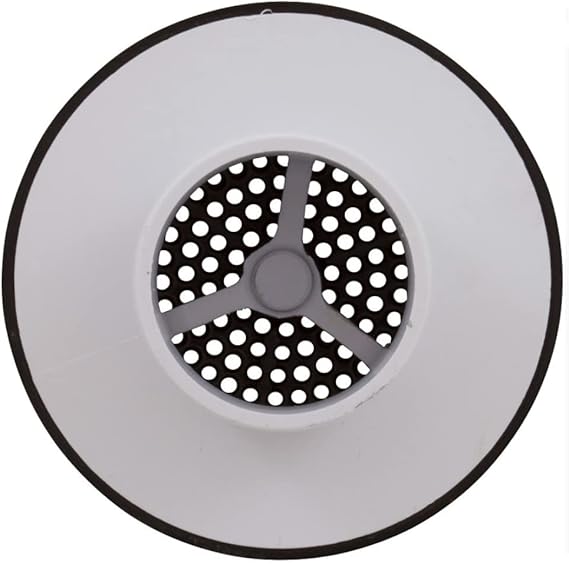 Round white and black suction outlet cover with perforated center and three-spoke grille