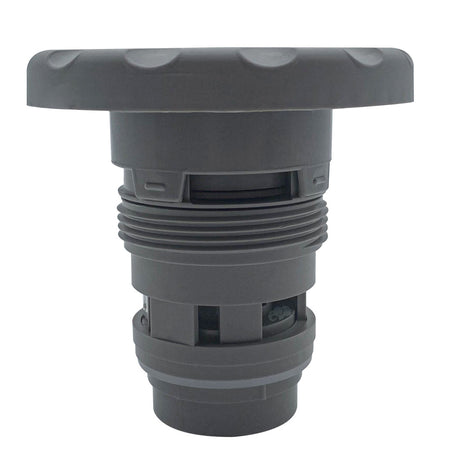 Gray Pentair in-floor pool jet barrel with rubber mold cap