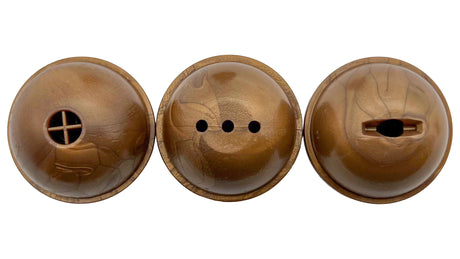 Three bronze in-floor pool deck jets with different spray openings