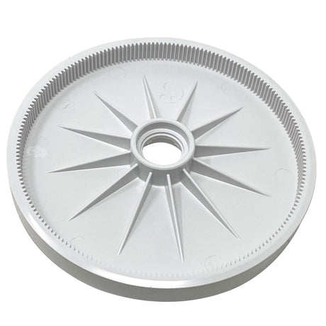Large white Polaris TankTrax cleaner wheel with central hub and toothed outer edge