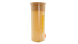 Tan plastic Quik Water Leveler unit with a cylindrical body and ribbed top on a white background