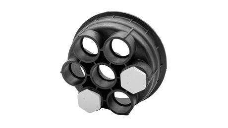 Black 4-port water valve base with two white plug caps attached