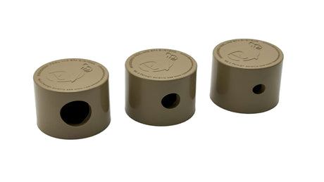Three beige Paramount PV3 pop-up head nozzle caps on a white background