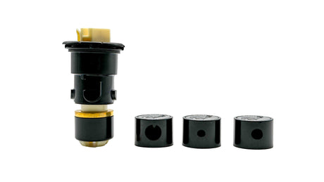 Black Paramount PV3 pop-up head with three nozzle caps displayed on white background