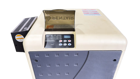 Pentair MasterTemp pool heater with digital control panel and beige cabinet