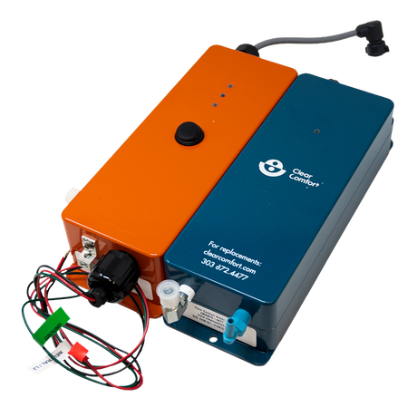 Clear Comfort CCW100 water treatment unit with installation kit, orange and blue housing with attached wiring and fittings